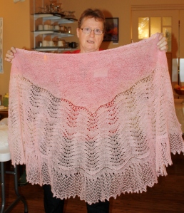Anne displaying one of her lace shawls at the 2013 Retreat.