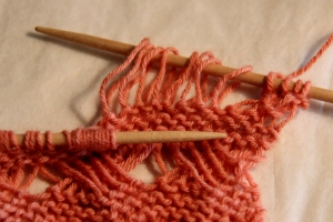 Slip the stitches and then straighten them up before twisting them.